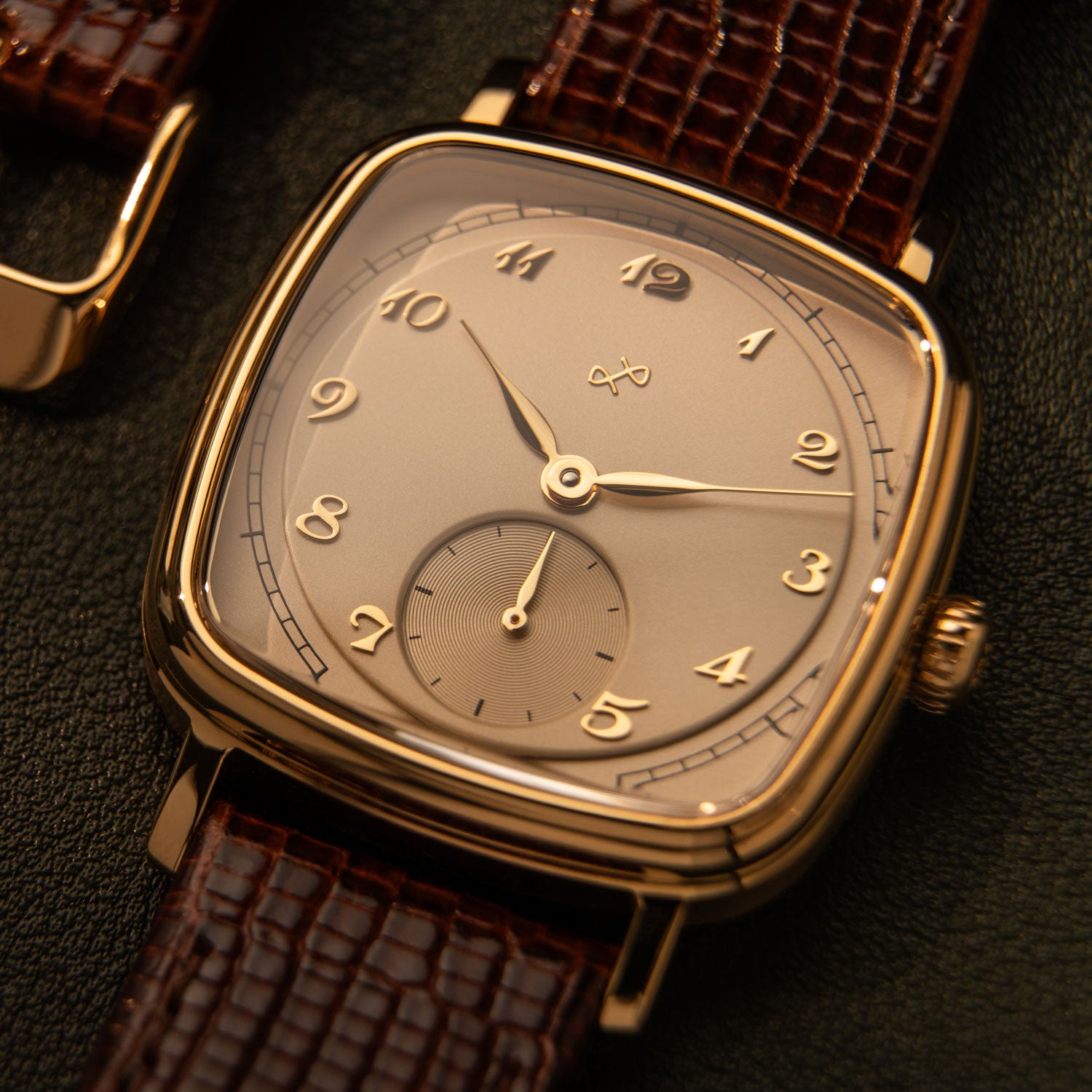 Vintage-inspired AV86 dress watch with cushion case, mechanical small seconds subdial, curved sapphire crystal, and textured leather strap.
