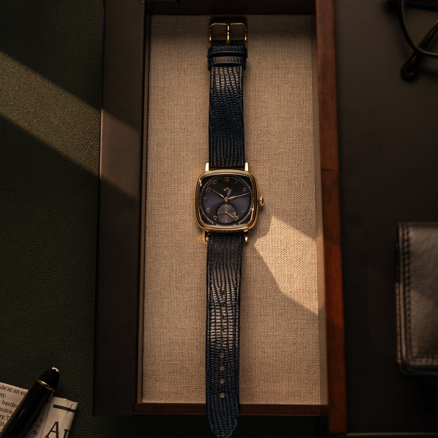 1954 Amalfi Mechanical by AV86 luxury dress watch with polished gold case, small seconds, textured blue leather strap