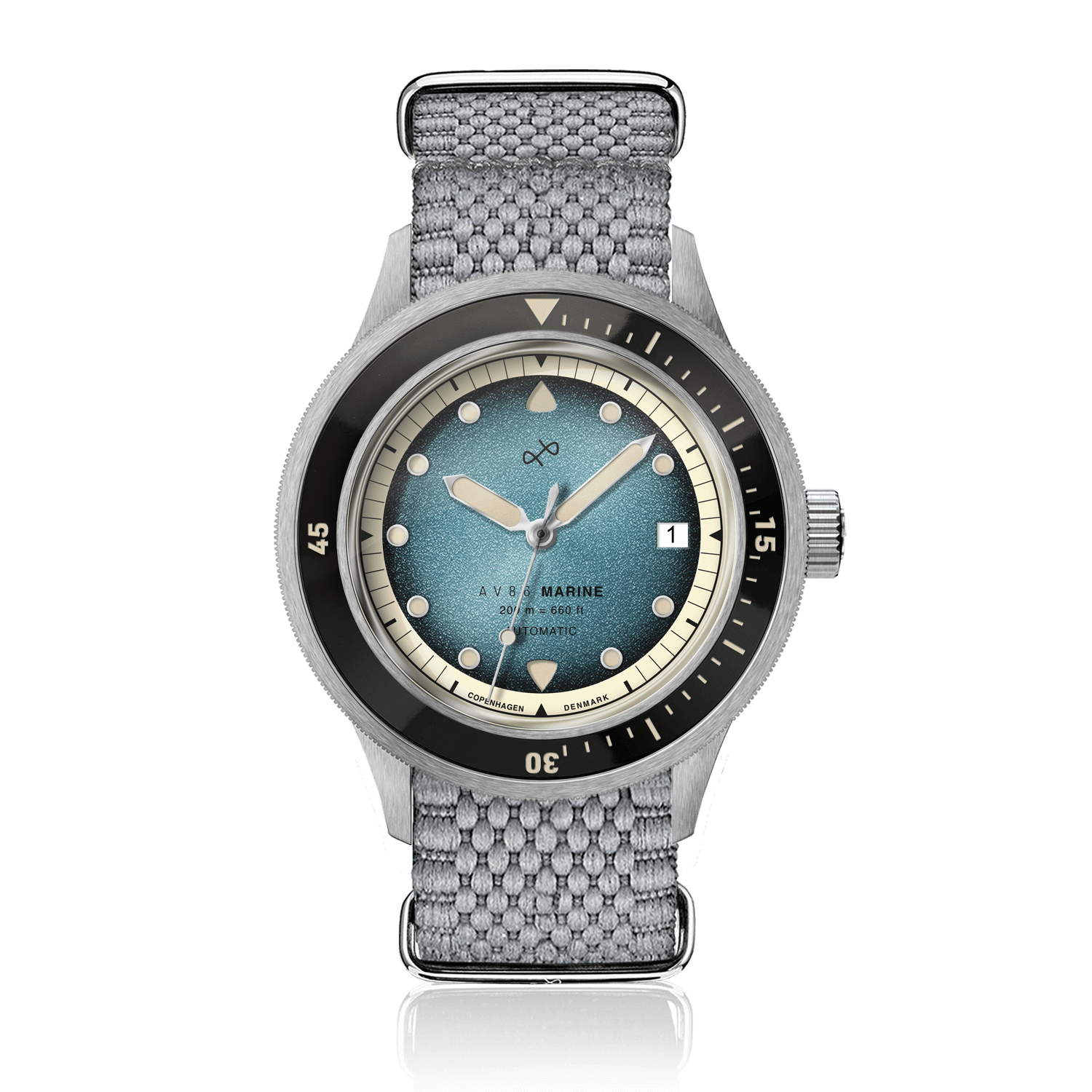 1956 Marine Automatic, Steel / Blue Fade featuring a vintage-inspired blue fade dial, stainless steel case, and woven grey strap by AV86.