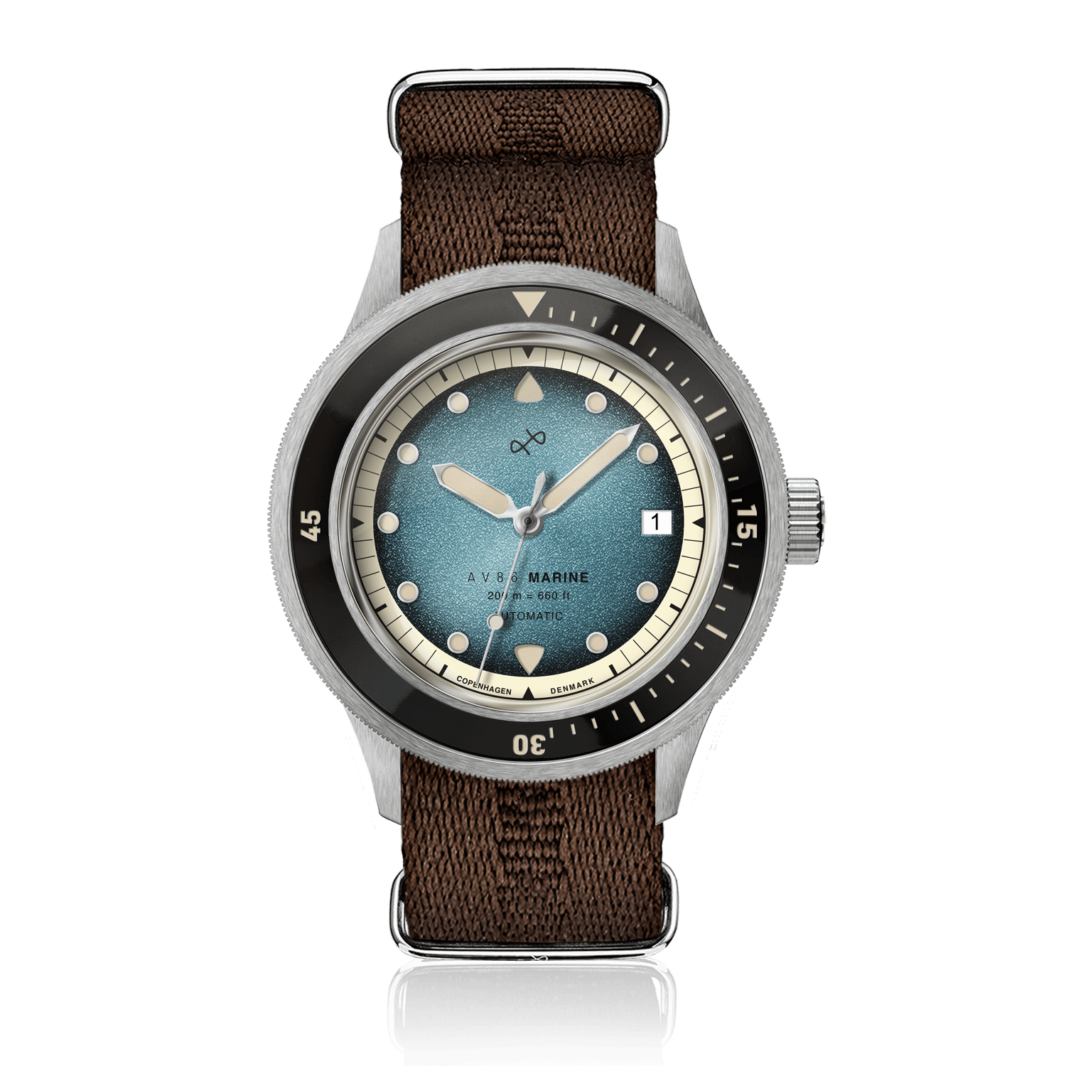 1956年製 Marine Automatic、スチール/ブルーフェード。ヴィンテージ風のブルーフェード文字盤、スチールケース、AV86製のブラウンファブリックストラップを採用しています。