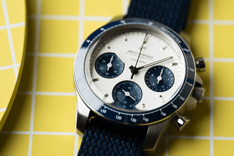 1960 Racing Chronograph by AV86 vintage-inspired chronograph with sapphire crystal, tachymeter bezel, and navy fabric strap