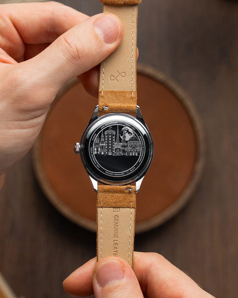 1968 Moonphase by AV86 featuring engraved case back with cityscape, sapphire crystal, and brown genuine leather strap