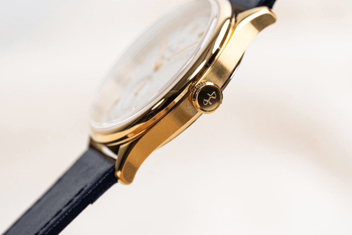 1968 Mechanical by AV86 automatic dress watch with sapphire crystal, gold case, and black leather strap