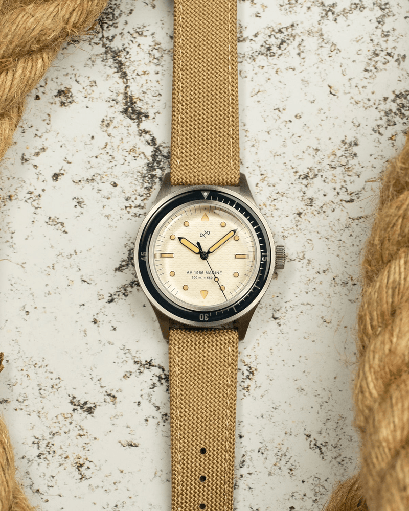 1956 Marine by AV86 vintage-inspired diver with acrylic bezel, luminous markers, and textured fabric strap