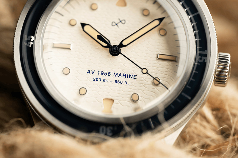 1956 Marine by AV86 vintage-inspired diver with acrylic filled bezel, big luminous markers, and textured dial detail
