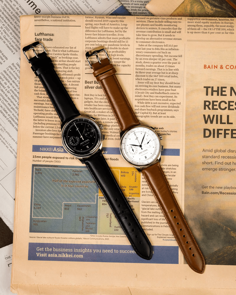 1934 Telechron, Steel / Black by AV86, a vintage-inspired chronograph featuring a polished case, dual subdials, date window, sapphire crystal, and a smooth black leather strap embodying Nordic minimalism and horological precision.