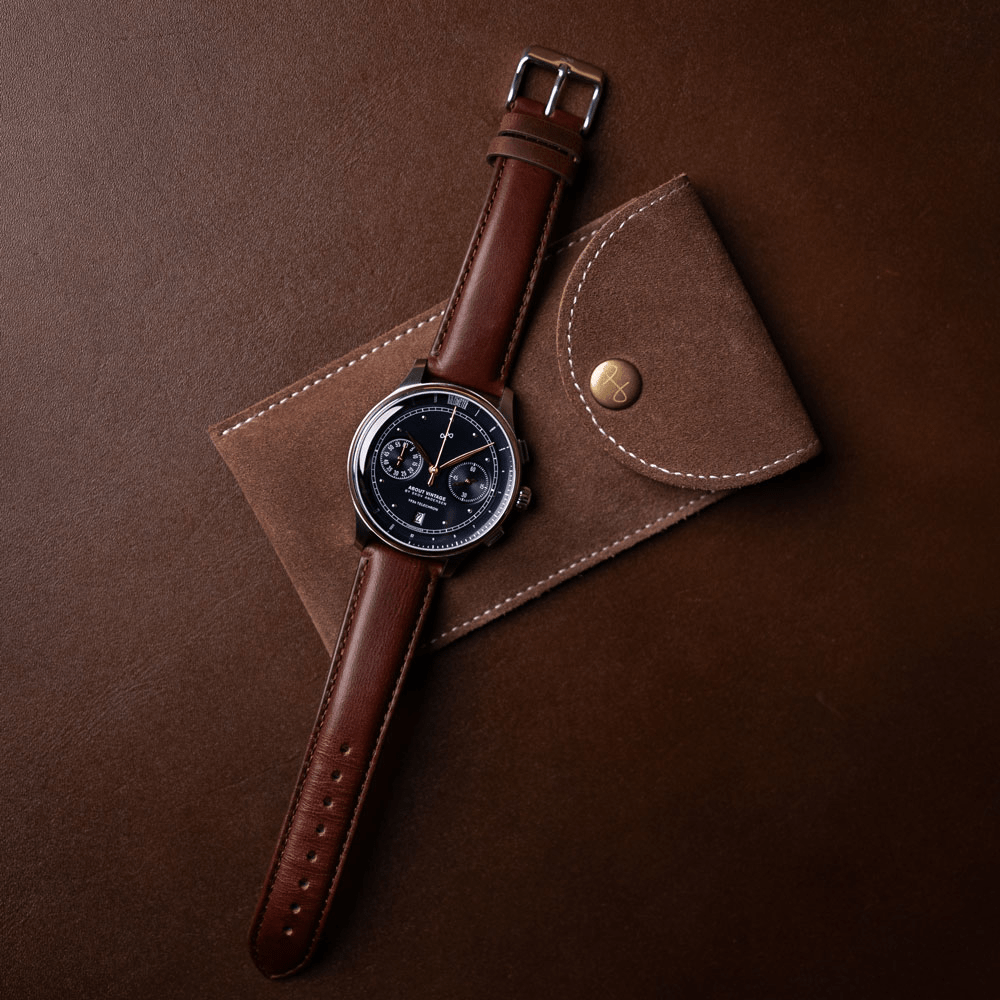 1934 Telechron by AV86 vintage-inspired chronograph with telemeter, sapphire crystal, and brown leather strap on suede pouch