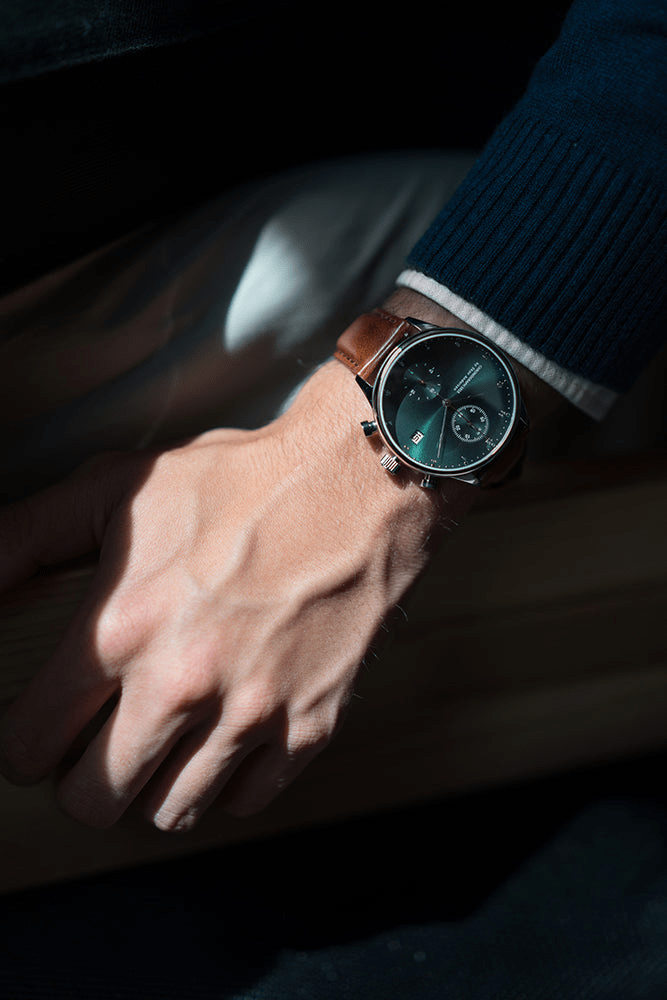 1815 Chronograph by AV86 with vintage-inspired dial, sapphire crystal, chronograph subdials, and brown leather strap on wrist