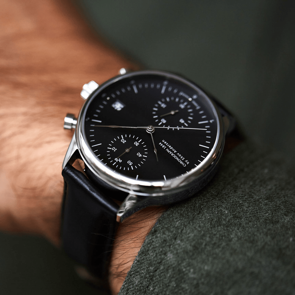1844 Chronograph by AV86 with precision black dial, sapphire crystal, polished steel case, and black leather strap