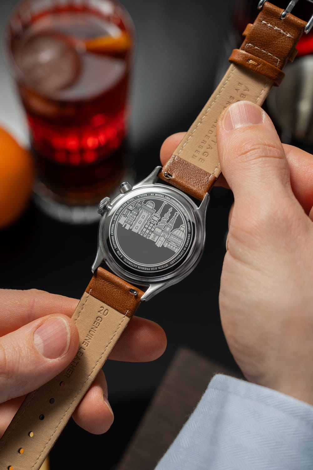 1564 Chronodate Automatic by AV86 with engraved case back, automatic movement, and brown genuine leather strap