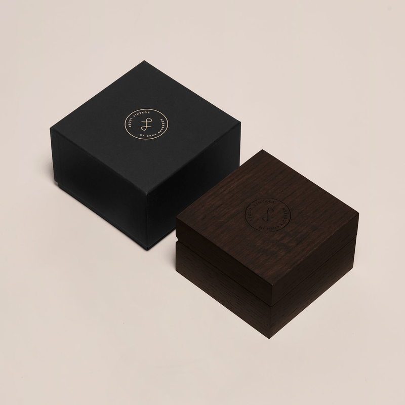 1968 Mechanical by AV86 elegant luxury watch packaging with black textured sleeve and dark wood presentation box