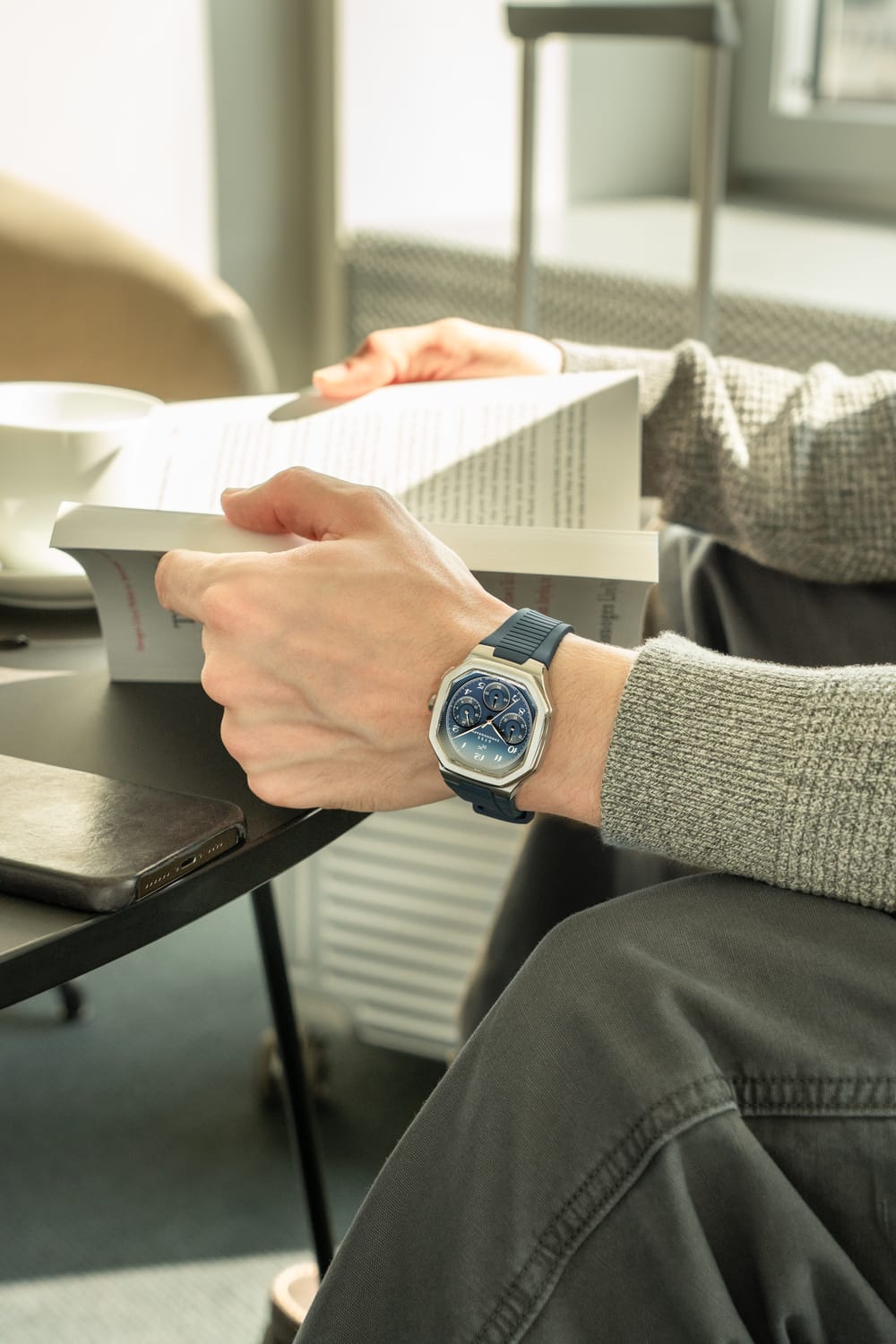1904 Chronograph by AV86 with angular case, blue dial, chronograph function, sapphire crystal, and blue rubber strap