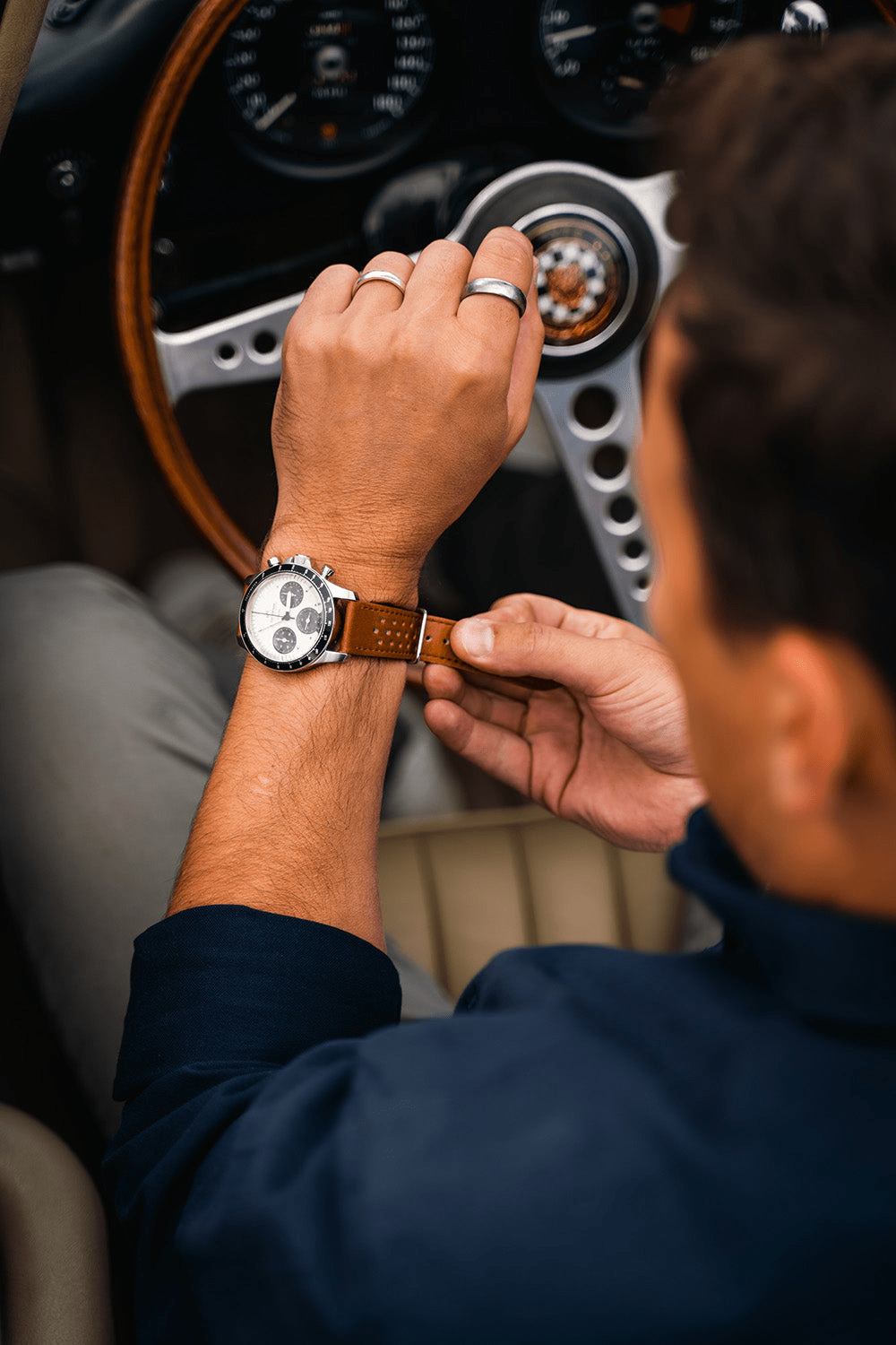 1960 Racing Chronograph by AV86 with vintage-inspired dial, sapphire crystal, chronograph subdials, and perforated leather strap in classic setting