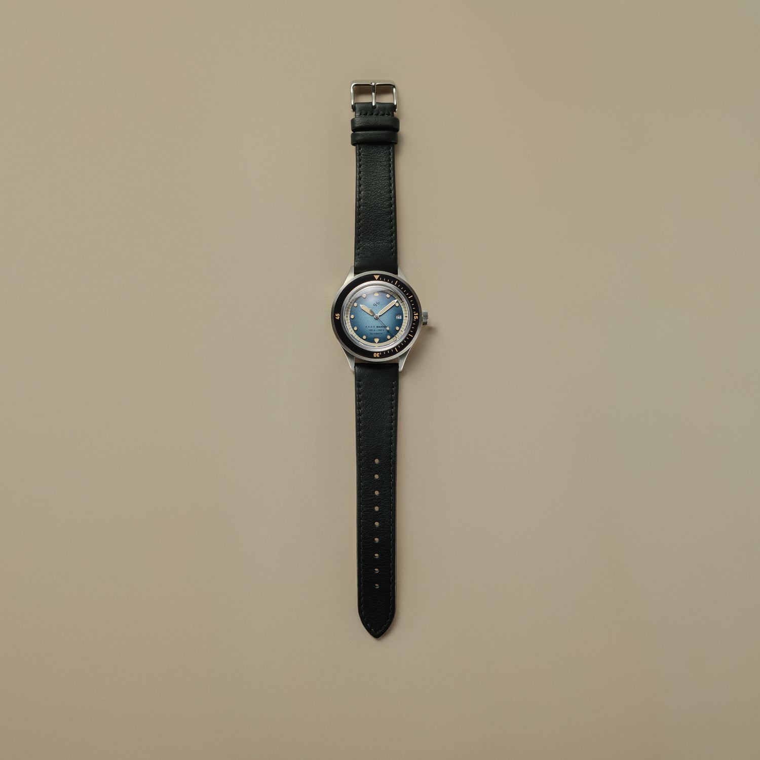 1956 Marine Automatic, Steel / Blue Fade vintage-inspired watch by AV86 with blue fade dial and black leather strap in Nordic minimalist style