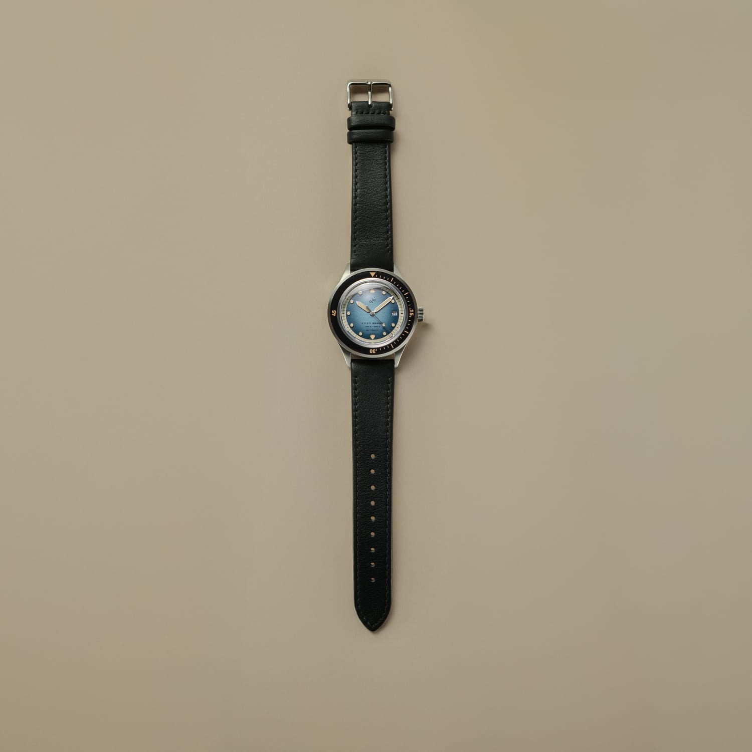 1956 Marine Automatic, Steel / Blue Fade vintage-inspired watch by AV86 with blue fade dial and black leather strap in Nordic minimalist style