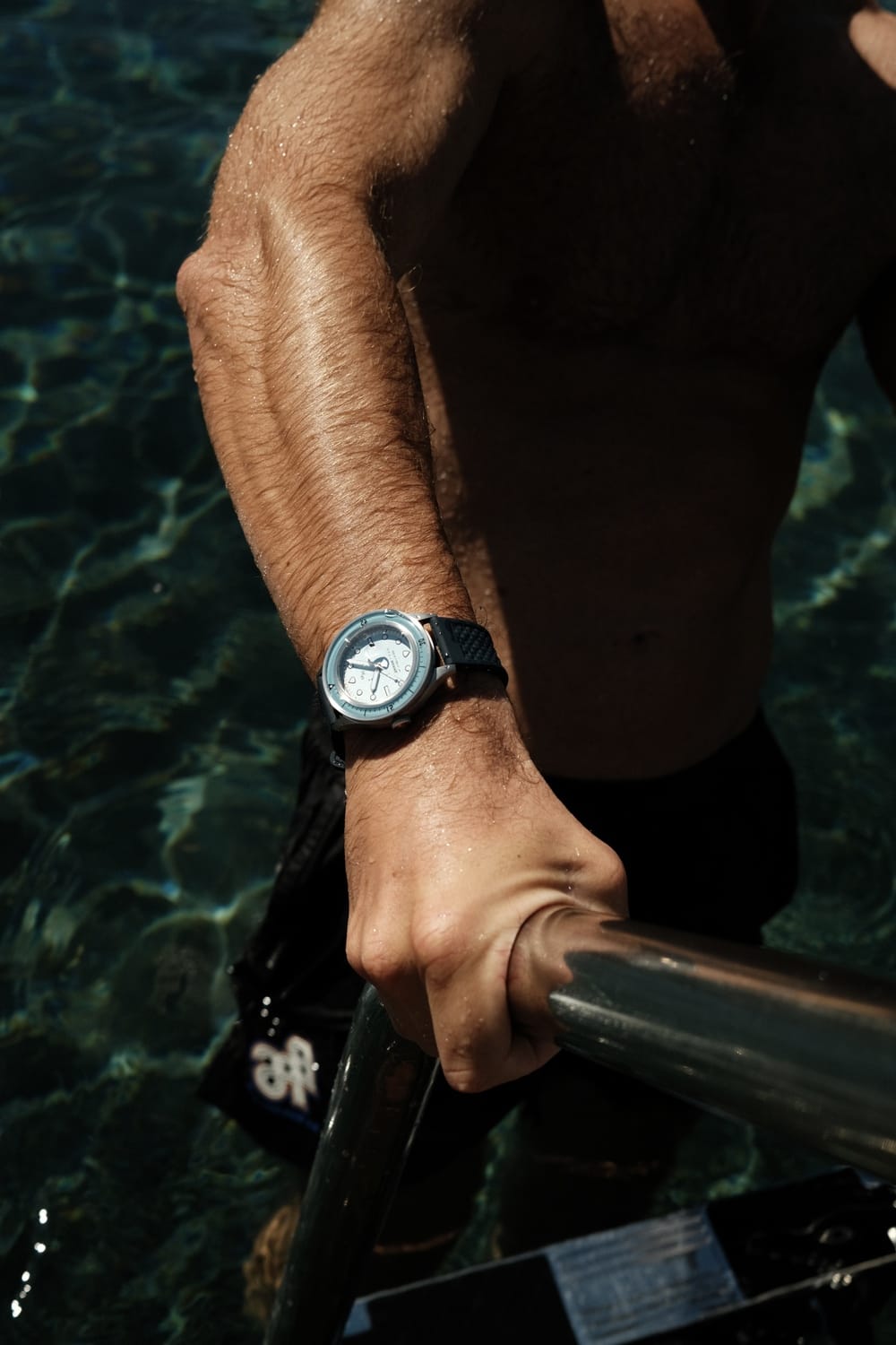 1956 Marine by AV86 diver watch with vintage-inspired dial, sapphire crystal, compass bezel, and textured rubber strap