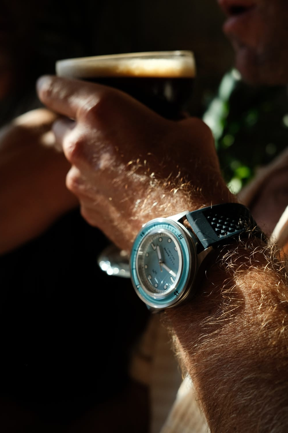 1956 Marine by AV86 vintage-inspired diver with sapphire crystal, compass bezel, and textured rubber strap in casual setting
