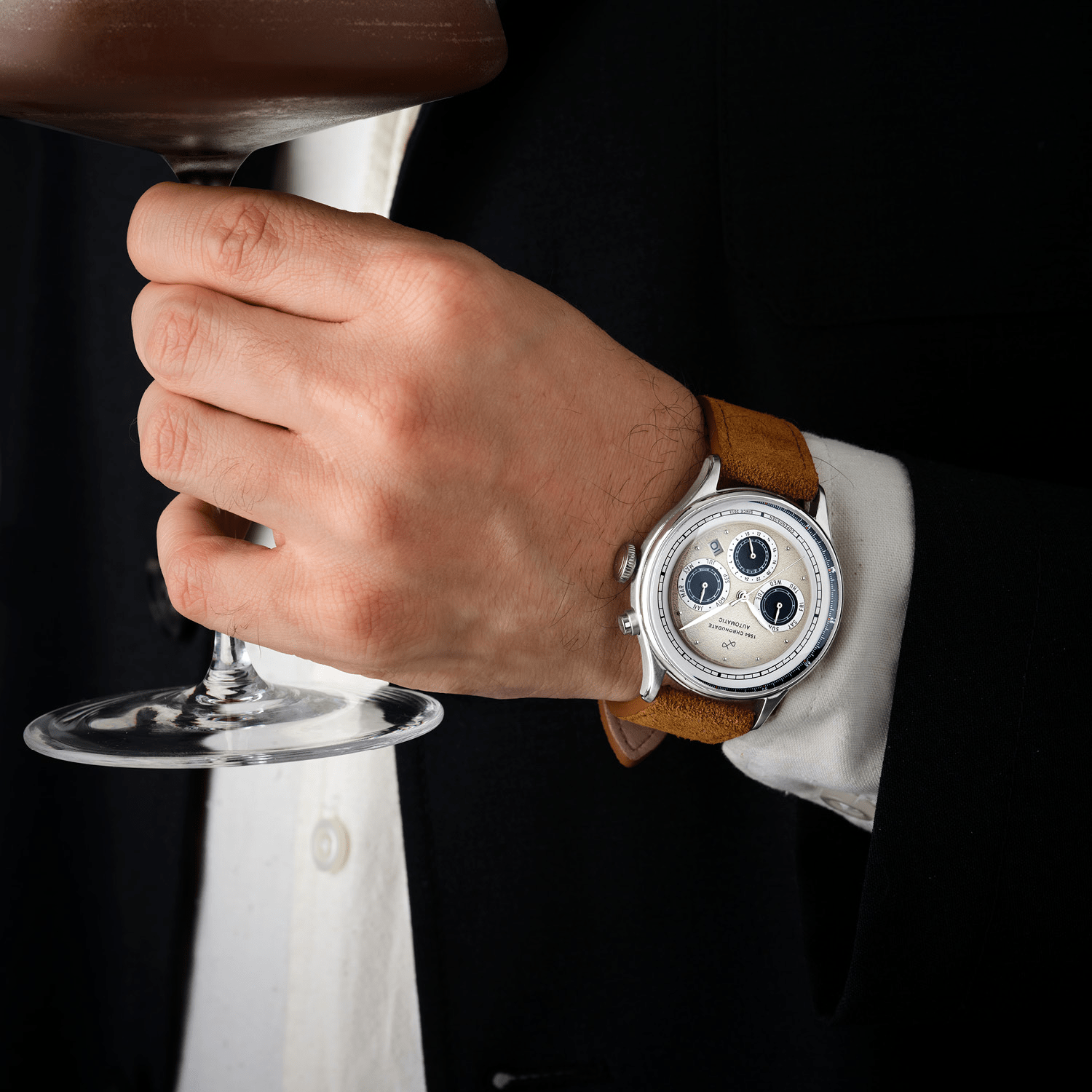 1564 Chronodate Automatic by AV86 luxury vintage-inspired chronograph with sapphire crystal and brown leather strap on wrist