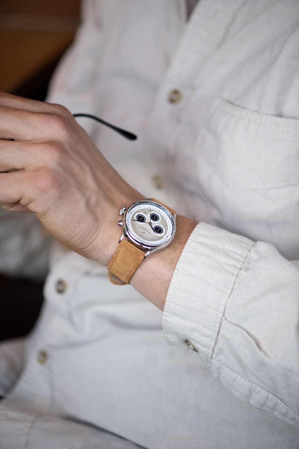 1564 Chronodate Automatic by AV86 with vintage chronograph dial, sapphire crystal, and tan leather strap worn with casual neutral attire