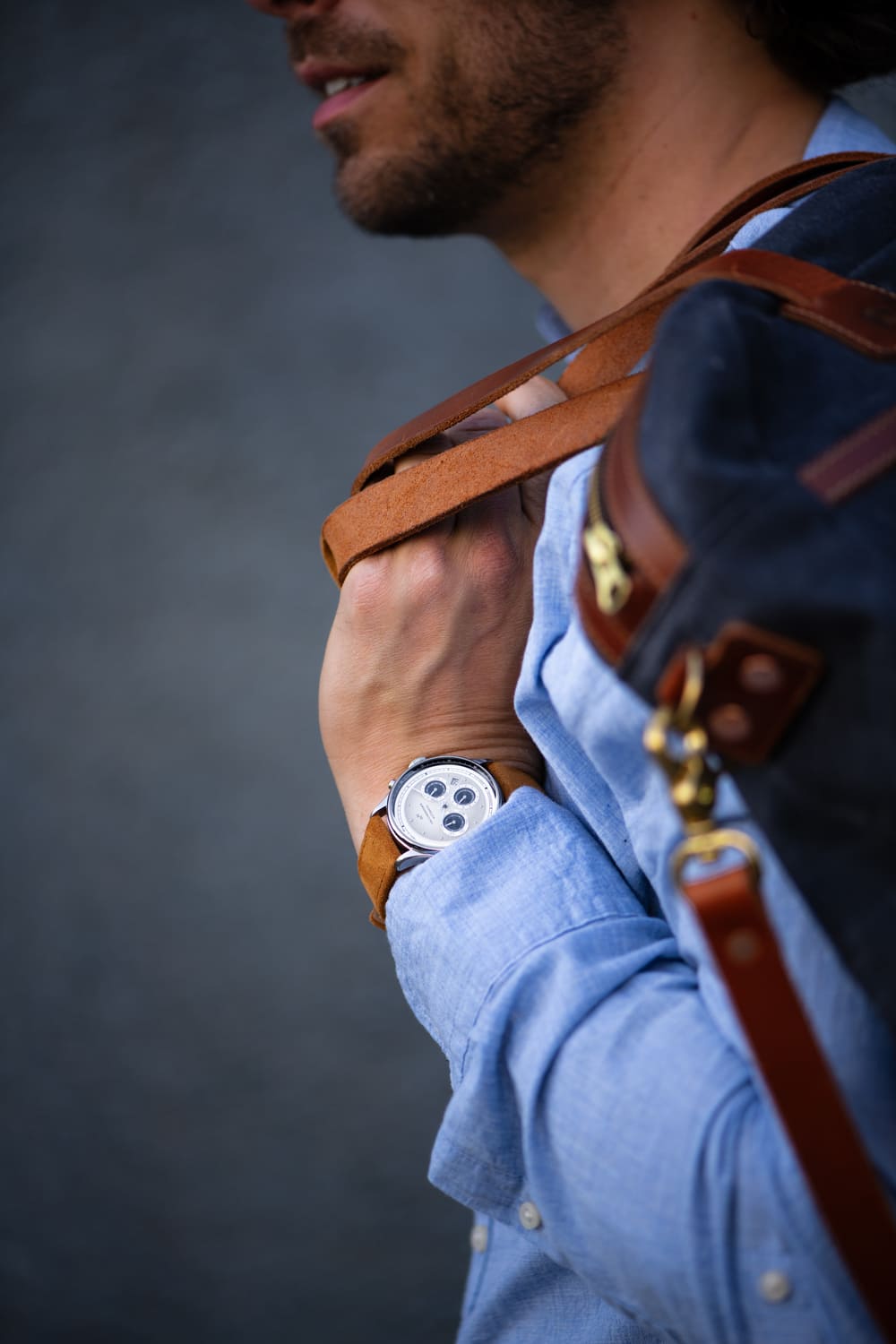 1564 Chronodate Automatic by AV86 worn with casual attire, showcasing vintage-inspired chronograph dial and leather strap.