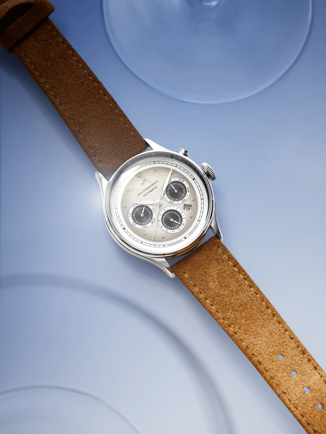1564 Chronodate Automatic by AV86 vintage-inspired chronograph with sapphire crystal, textured dial, and brown leather strap