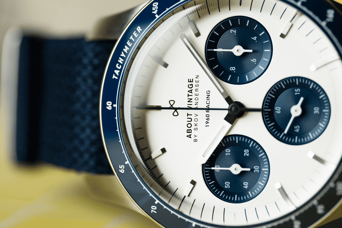 1960 Racing Chronograph by AV86 with vintage-inspired dial, tachymeter bezel, sapphire crystal, and textured navy strap