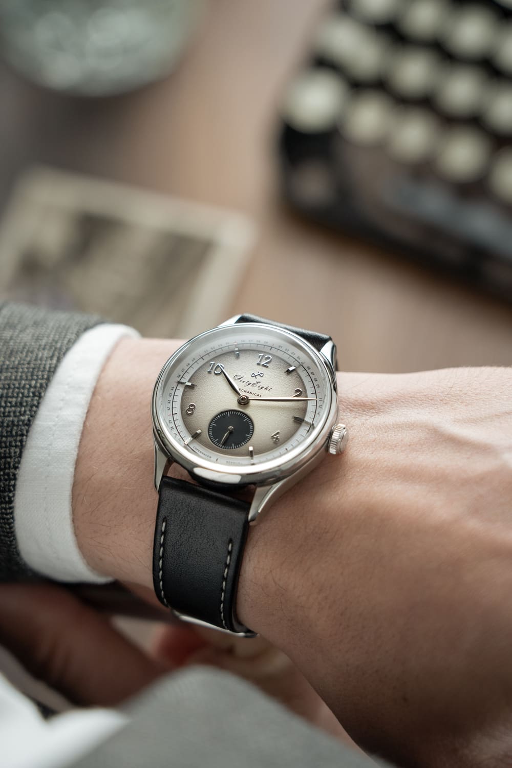 1968 Mechanical (Hand-Wound) by AV86 vintage-inspired dress watch with sapphire crystal, textured dial, and black leather strap