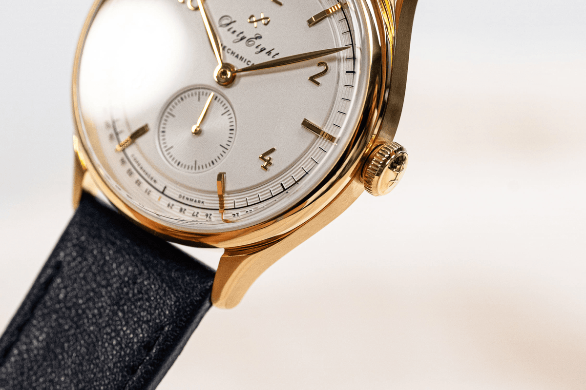 1968 Mechanical by AV86 luxury vintage-inspired automatic with sapphire crystal, gold case, minimalist dial, and black leather strap