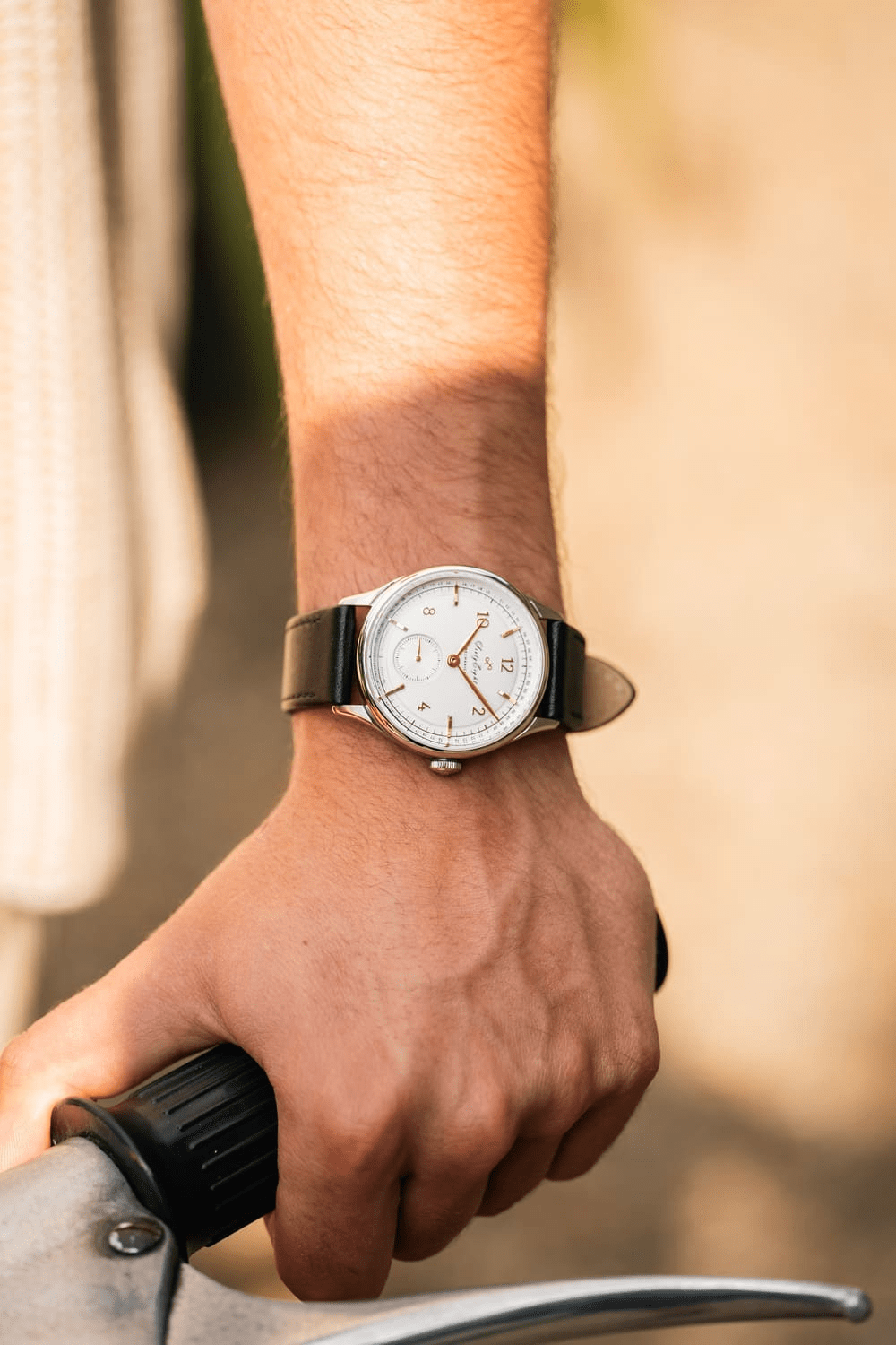 1968 Mechanical by AV86 vintage-inspired automatic watch with sapphire crystal, minimalist dial, and black leather strap on wrist