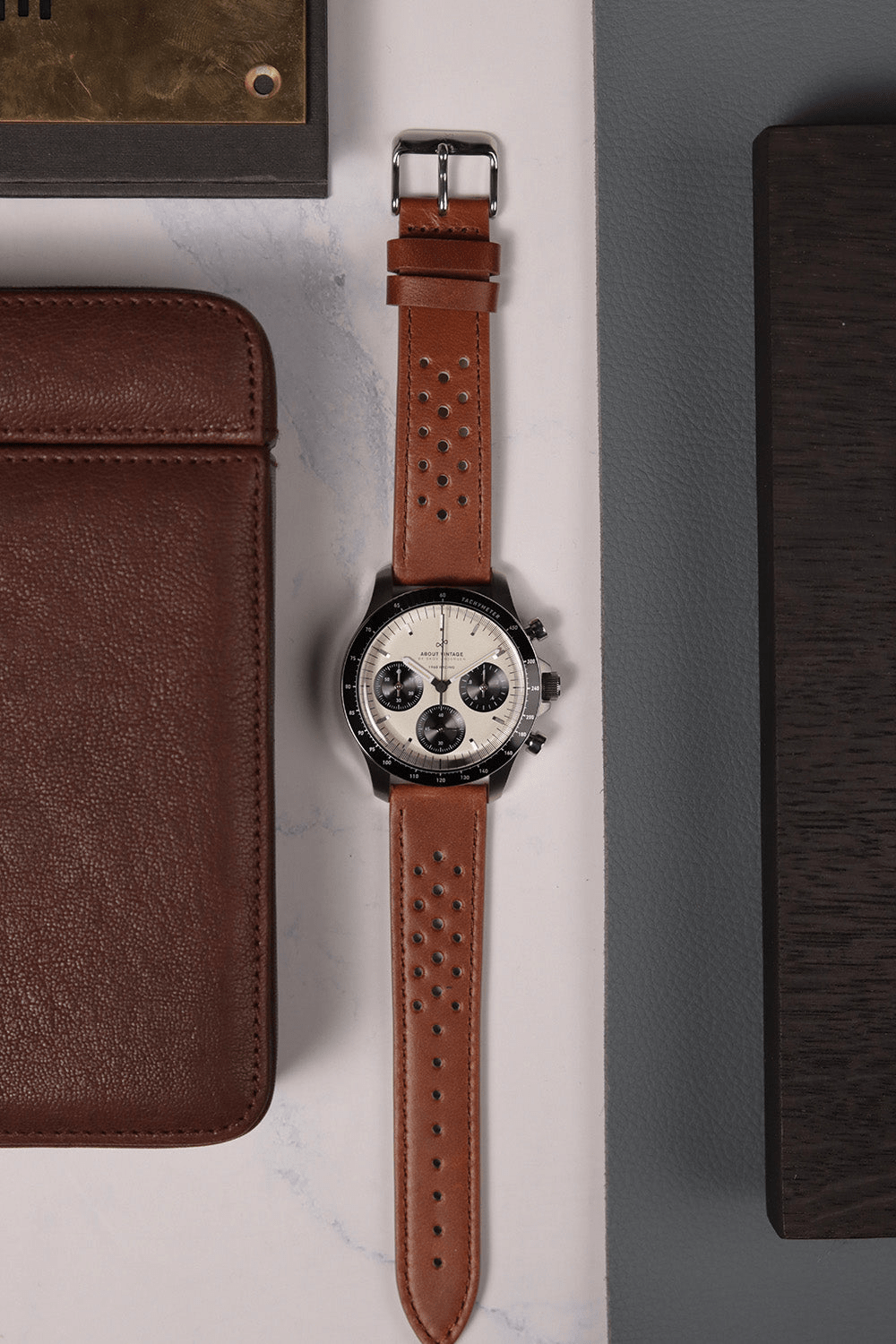 1960 Racing Chronograph by AV86 with vintage-inspired dial, sapphire crystal, chronograph subdials, and perforated leather strap