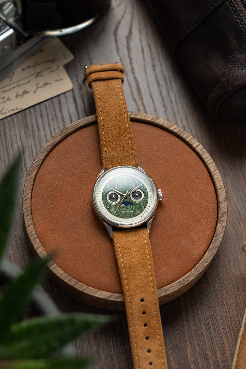 1968 Moonphase with vintage-inspired green guilloché dial, moonphase complication, sapphire crystal, and tan suede leather strap by AV86