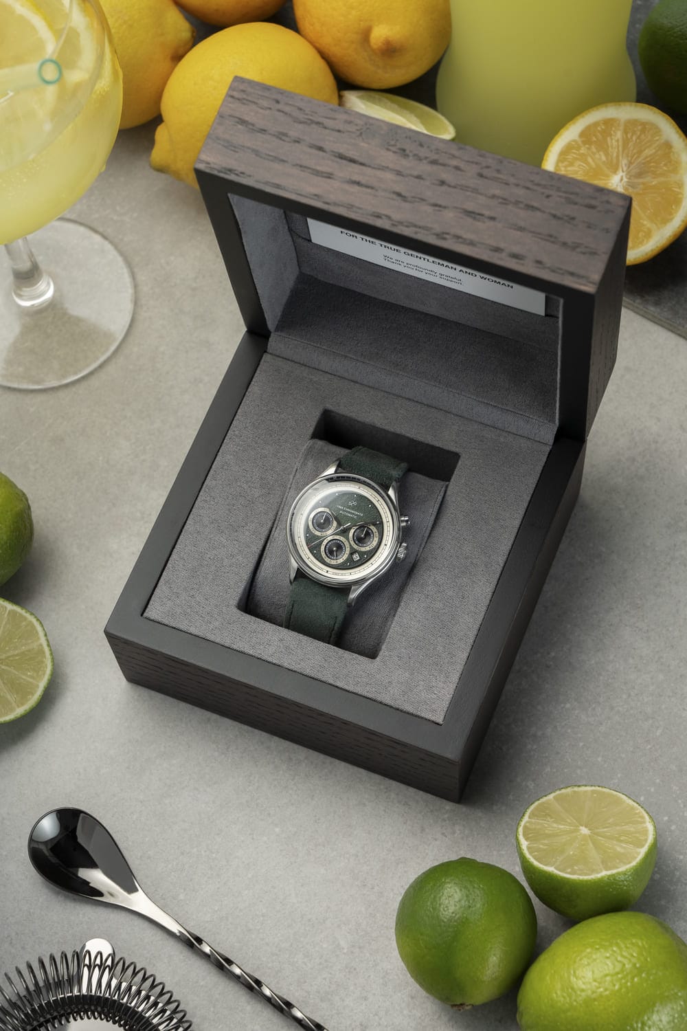 1564 Chronodate Automatic by AV86 luxury chronograph with sapphire crystal, vintage-inspired dial, and green leather strap in wooden box