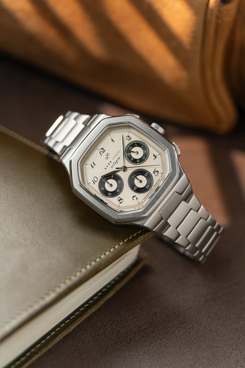 1904 Chrono, Steel / Off White & Black by AV86 features a refined chronograph dial with sapphire crystal, stainless steel case, and integrated bracelet, exuding Nordic minimalism and horological excellence.