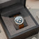 1564 Chronodate Automatic featuring a detailed chronograph dial with sapphire crystal, housed in a polished case with a brown leather strap, presented in a luxury AV86 watch box.