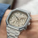 1904 Chrono, Steel / Off White luxury chronograph on wrist featuring a hexagonal stainless steel case, off white dial with three subdials, and integrated steel bracelet by AV86, embodying Nordic minimalism and Copenhagen design craftsmanship.