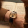 1954 Amalfi Mechanical by AV86, vintage-inspired automatic watch with sapphire crystal and leather strap in a classic setting with book pages