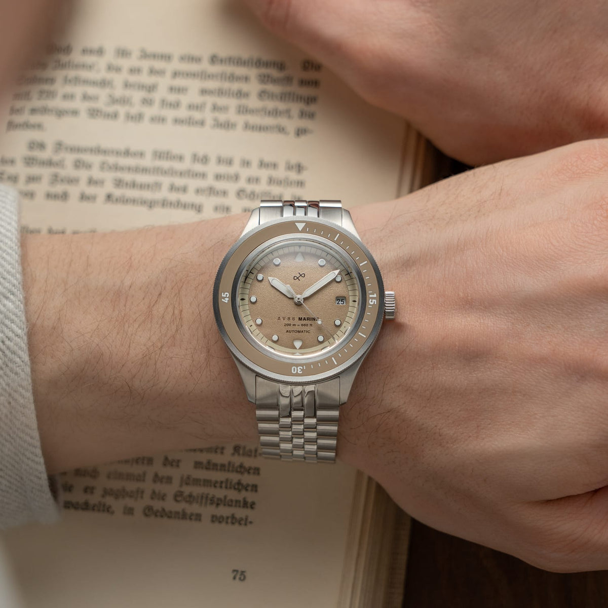 1956 Marine Automatic, Steel / Sand wristwatch by AV86 showing vintage-inspired dial and stainless steel bracelet on a wrist