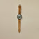1956 Marine Automatic, Steel / Green by AV86 with green dial and tan leather strap in Danish minimalist vintage-inspired design.