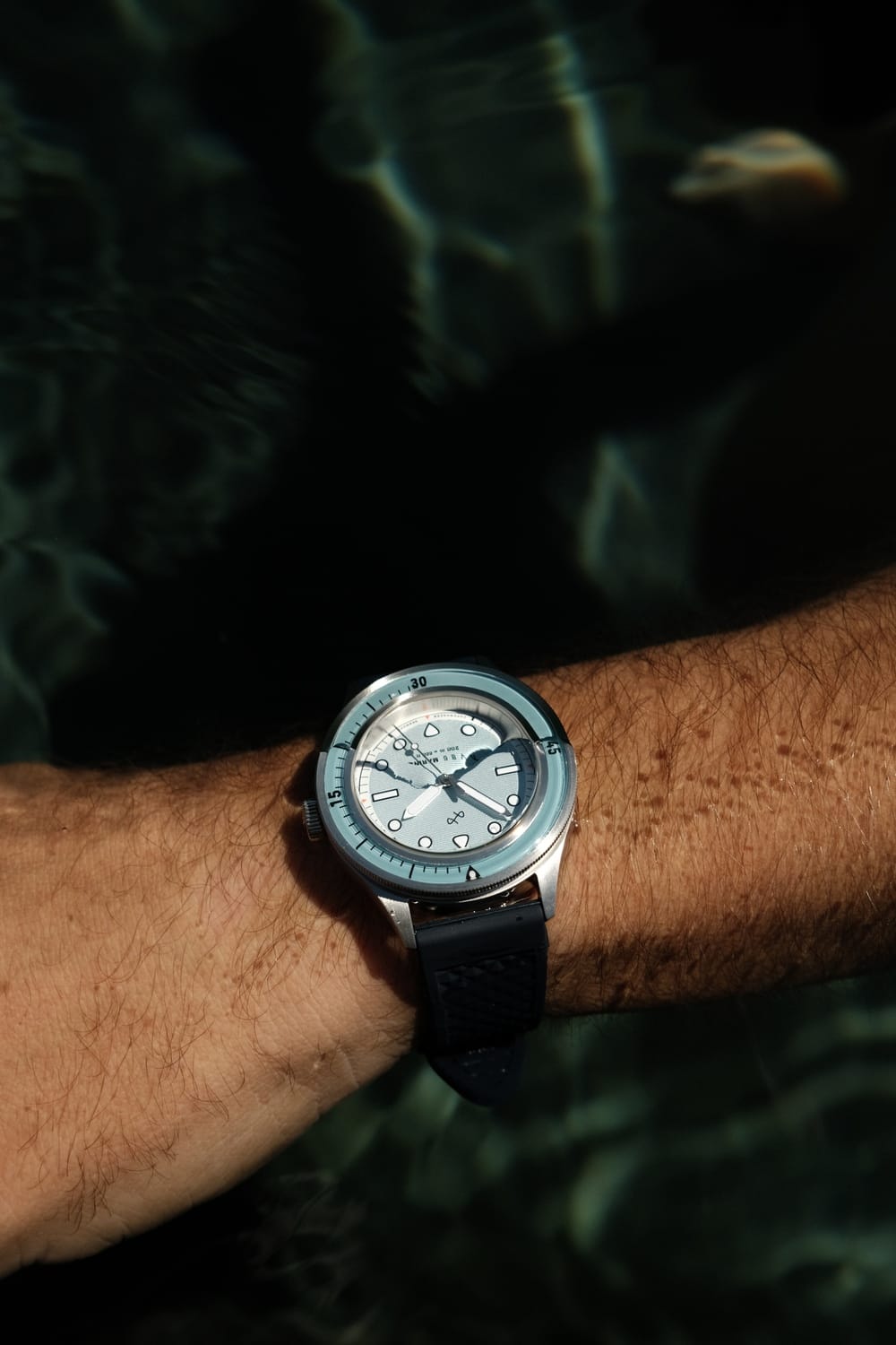 1956 Marine by AV86 vintage-inspired diver with sapphire crystal, compass bezel, and textured rubber strap on wrist