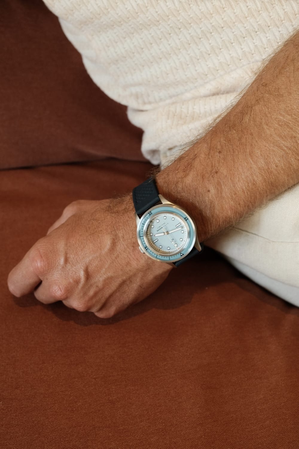 1956 Marine by AV86 luxury diver watch with sapphire crystal, compass bezel, and black textured rubber strap on wrist lifestyle setting