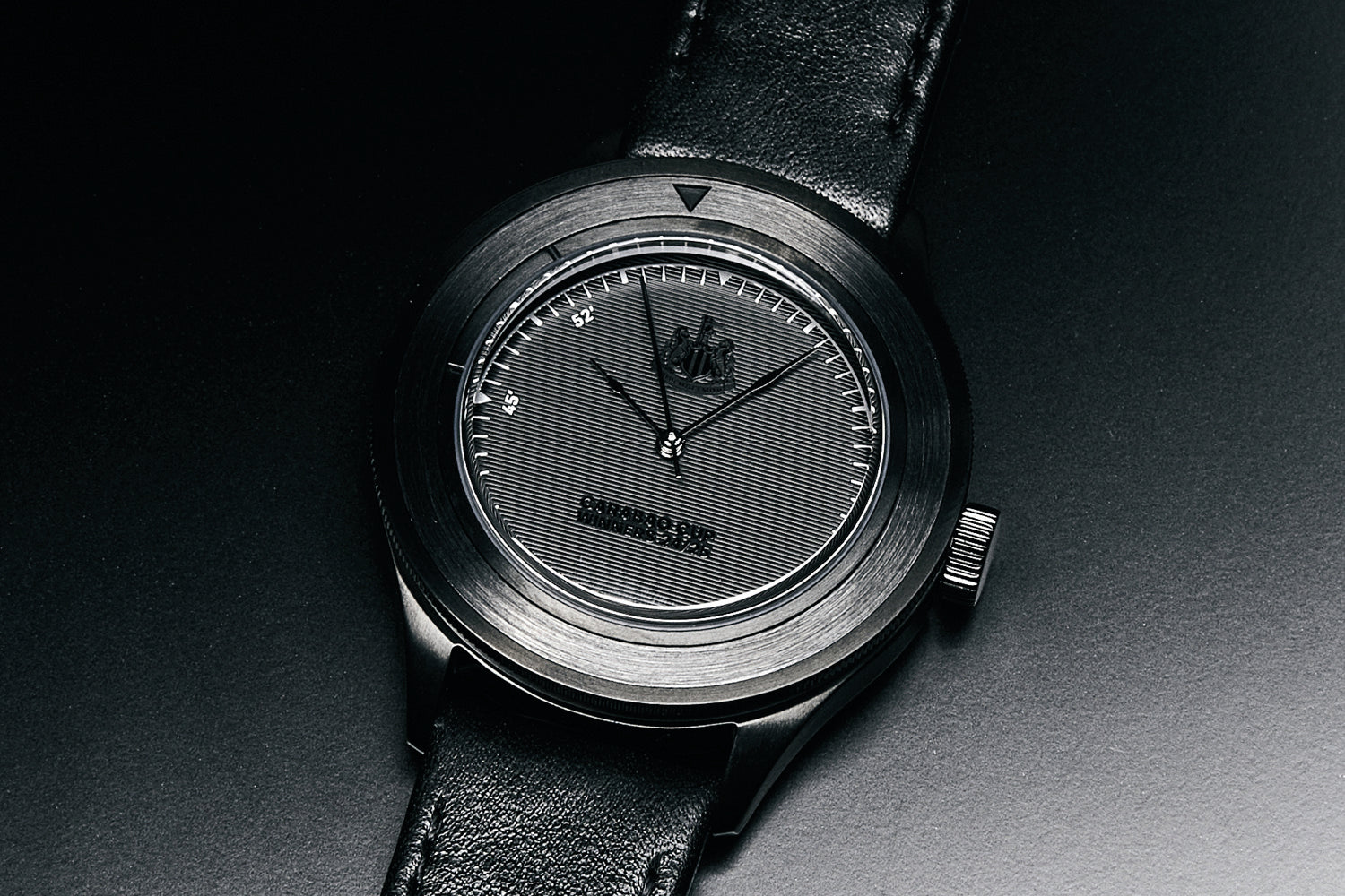 AV86 minimalist dress watch with textured dial, polished case, slim hands, crown, and black leather strap in Nordic style